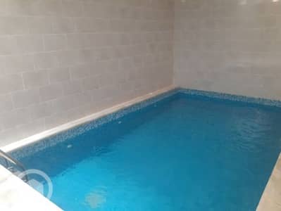 فیلا 4 غرف نوم للايجار في الزهراء، مدينة الكويت - Villa with a swimming pool for rent in Zahra