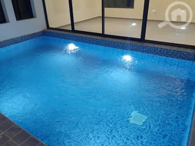 فیلا 6 غرف نوم للايجار في فنيطيس، مدينة الكويت - Villa with pool and garden for rent in Fnaitees