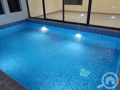 فیلا 6 غرف نوم للايجار في فنيطيس، مدينة الكويت - Villa with elevator, swimming pool, and garden for rent in Fnaitees