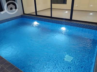 7 Bedroom Villa for Rent in Fnaitees, Kuwait City - Villa with elevator, pool, and garden available for rent in Fnaitees