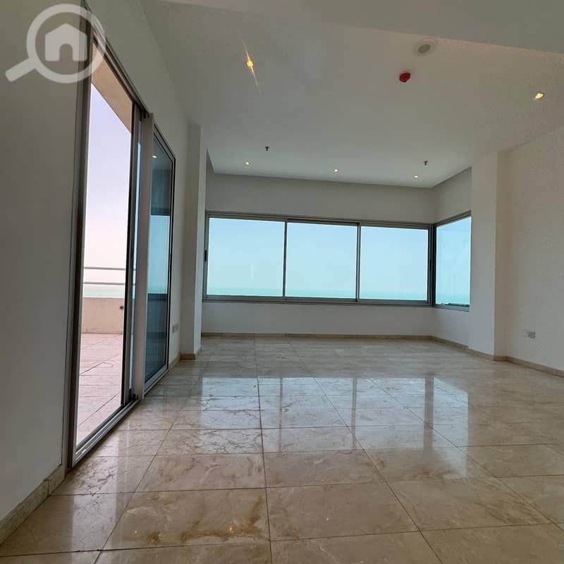 A semi-furnished duplex with a direct sea view for rent in Al-Shaab Al